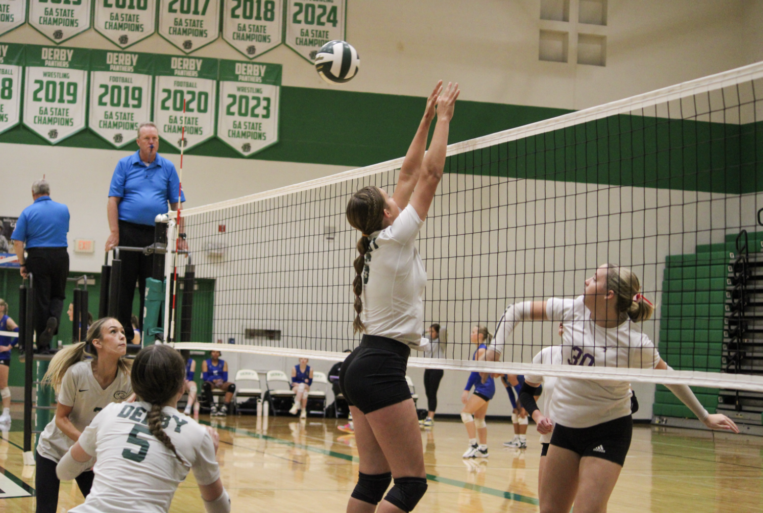 Varsity and JV volleyball (Photos by Delainey Stephenson)